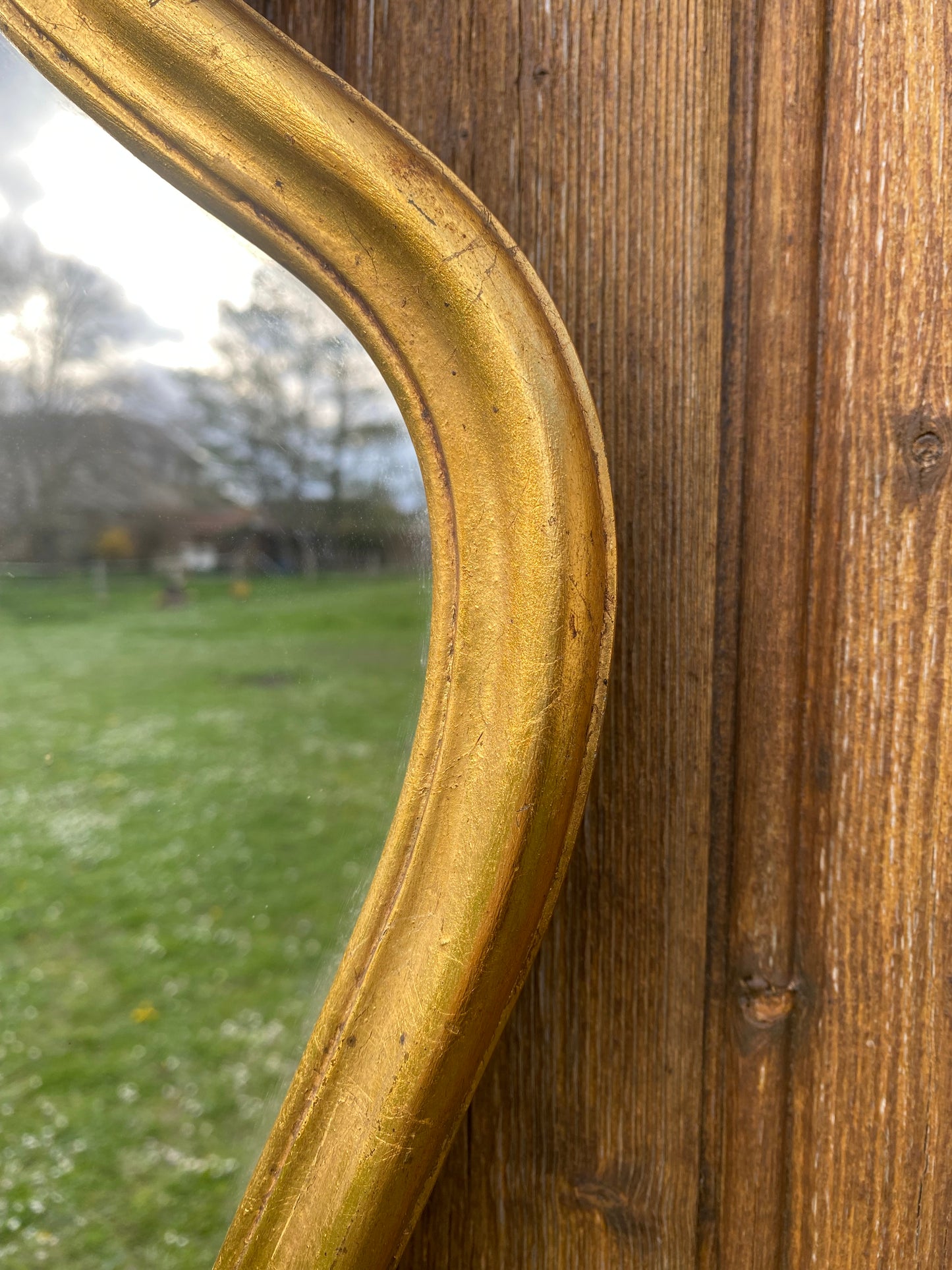 Miroir en bois doré style Louis XV