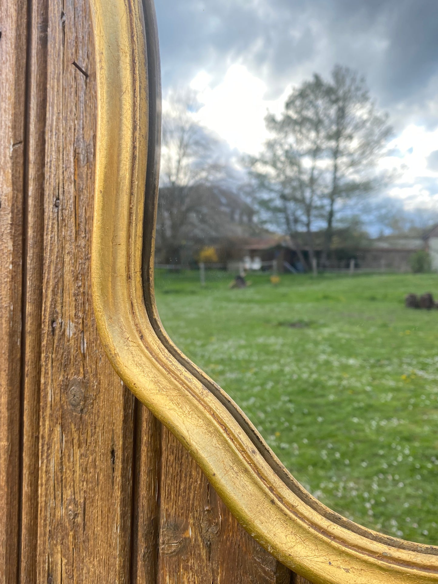 Miroir en bois doré style Louis XV