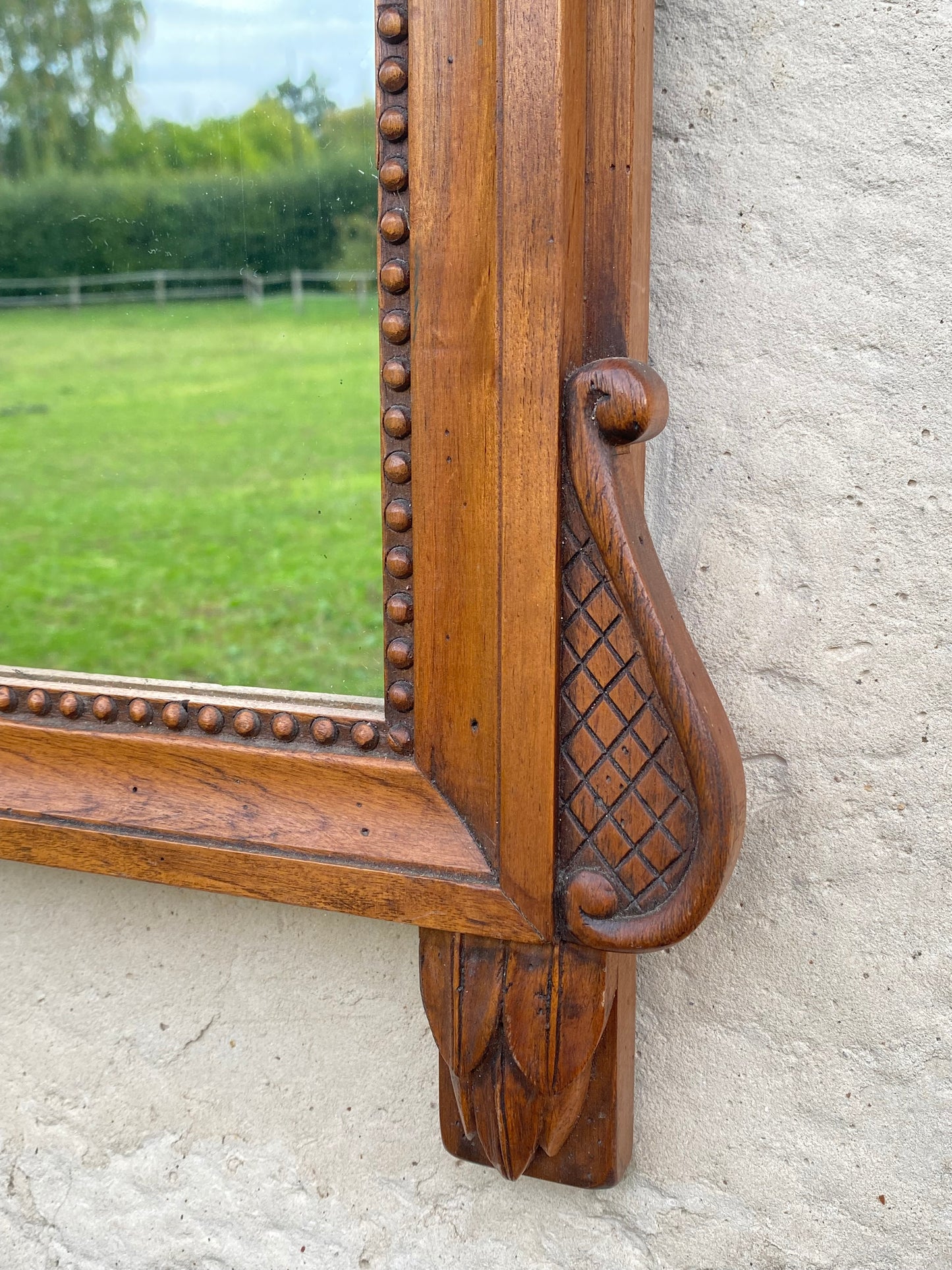 Miroir en bois sculpté 19ème à fronton