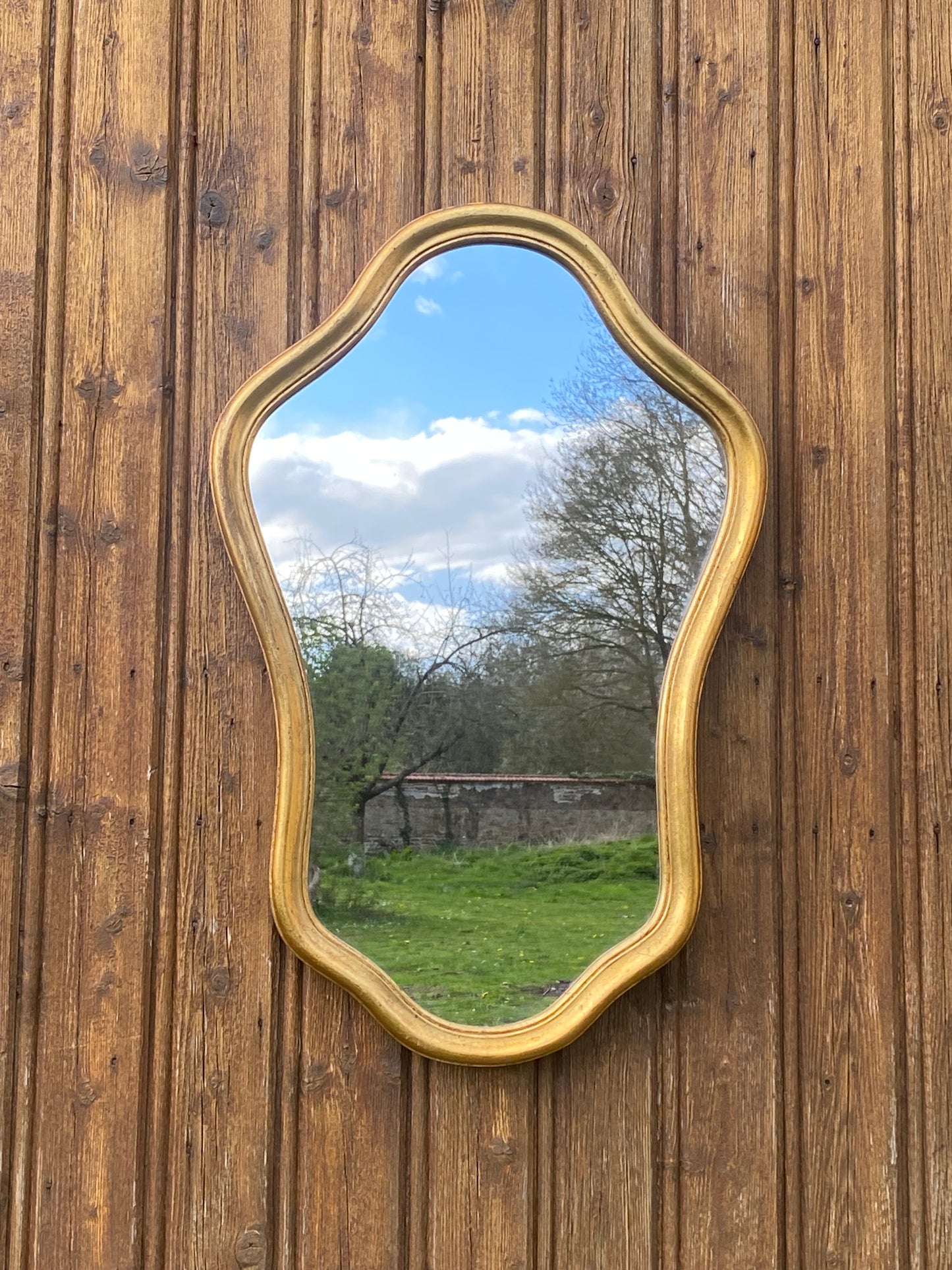 Miroir en bois doré style Louis XV
